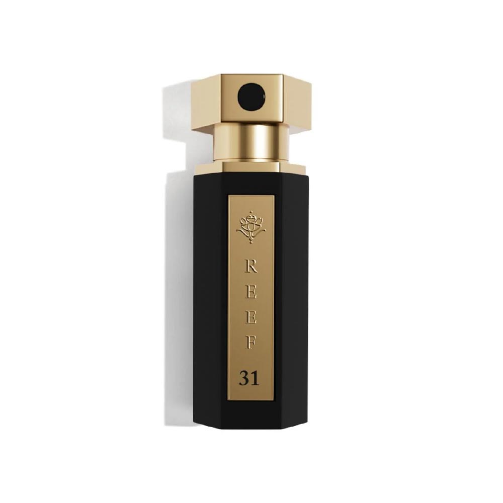 REEF – 31 Mini unisex parfumflacon op witte achtergrond met saffraan, amber en vanille – een elegante geur met een oriëntaalse signatuur